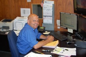 Joe sitting at desk
